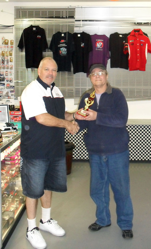 Stoo Amos happily accepting the trophy for 3rd place in CanAm